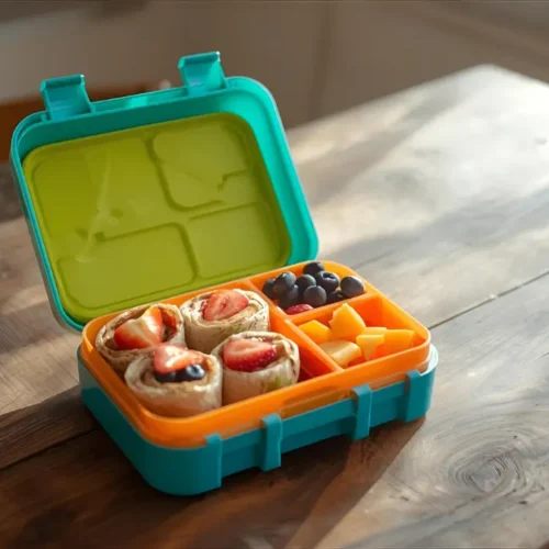 Healthy lunchbox recipes for kids – colorful school lunch with wraps, fruits, and yogurt